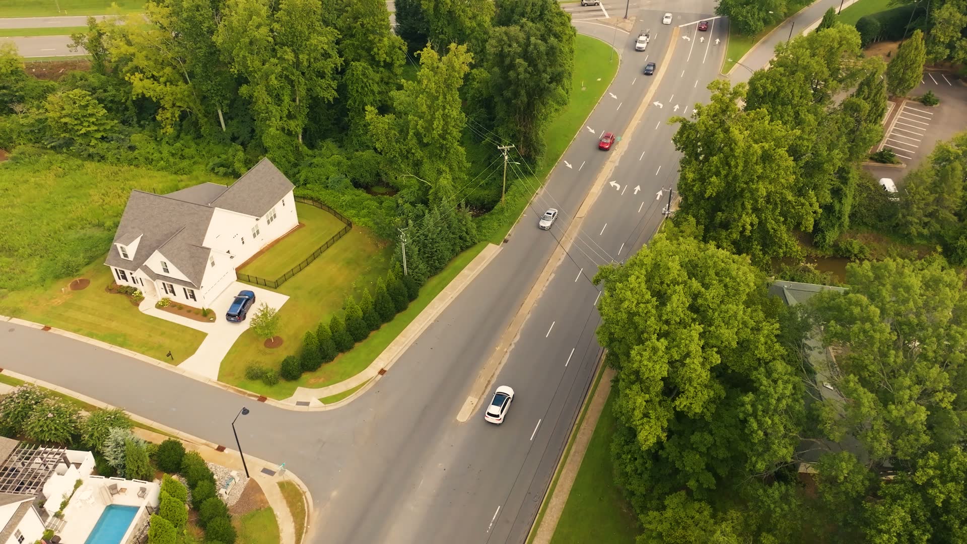An aerial view of a tree-lined Winston-Salem street