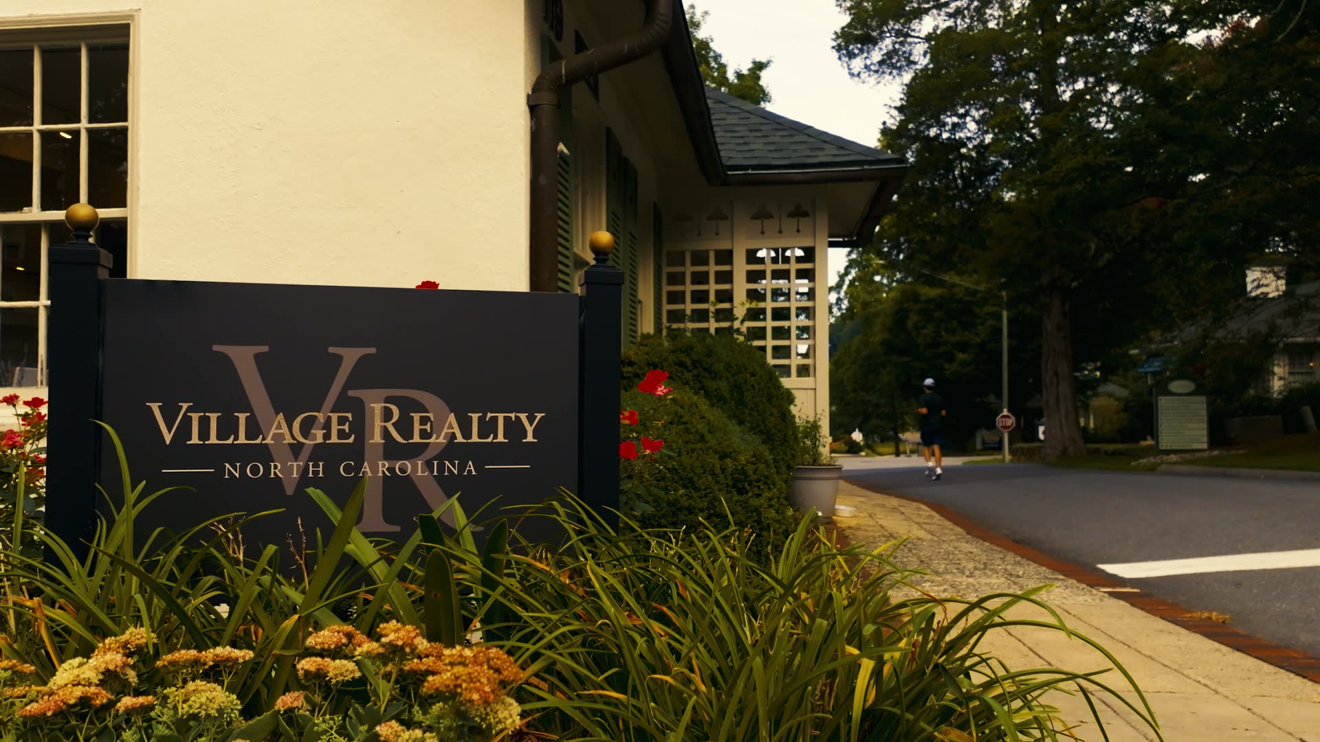 The Village Realty office sign on the lane in Reynolda Village